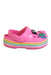 A Pink Slip Ons from Crocs in size 12-18M for girl. (Front View)