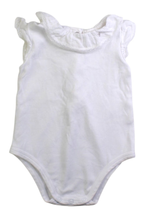 A White Sleeveless Bodysuits from Nanos in size 3-6M for girl. (Front View)