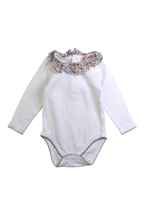 A White Long Sleeve Bodysuits from La Coqueta in size 3-6M for girl. (Front View)