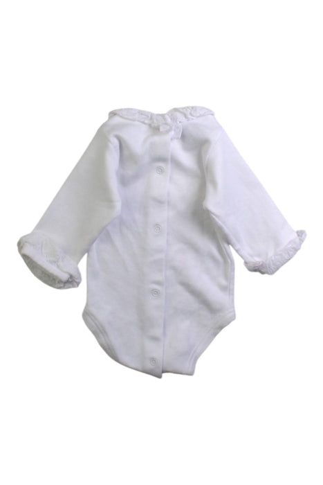 A White Long Sleeve Bodysuits from Babidu in size Newborn for girl. (Back View)