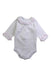 A White Long Sleeve Bodysuits from Babidu in size Newborn for girl. (Front View)