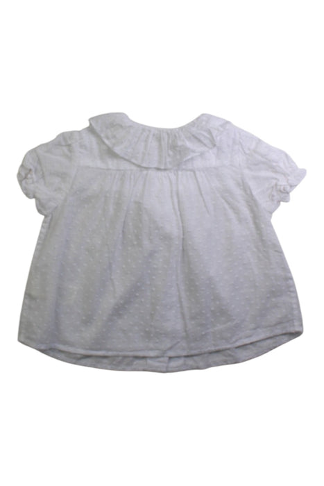A White Short Sleeve Tops from Nanos in size 3-6M for girl. (Back View)
