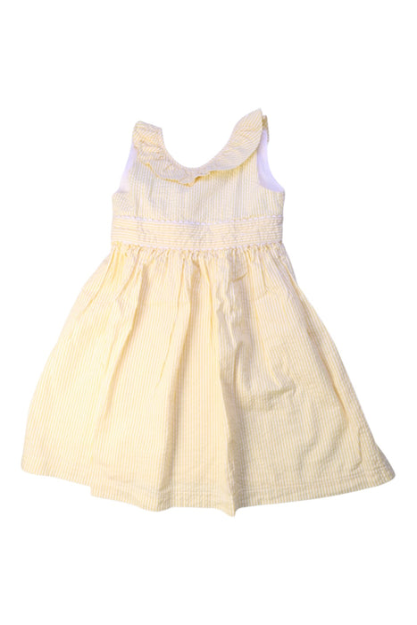 A Yellow Sleeveless Dresses from Confiture in size 5T for girl. (Front View)