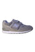 A Grey Sneakers from New Balance in size 4T for boy. (Front View)
