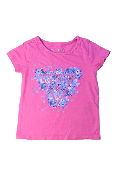 A Pink Short Sleeve T Shirts from Guess in size 2T for girl. (Front View)