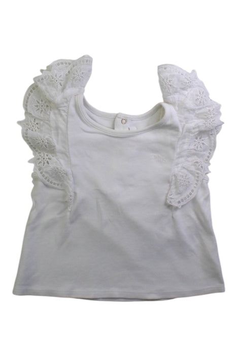 A White Sleeveless Tops from Chloe in size 6-12M for girl. (Front View)