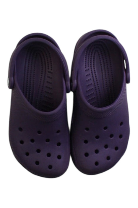 A Purple Slip Ons from Crocs in size 11Y for neutral. (Back View)
