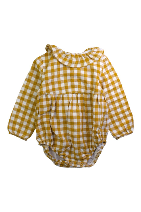 A Yellow Long Sleeve Rompers from Olivier London in size 12-18M for girl. (Front View)