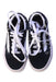 A Black Sneakers from Vans in size 4T for girl. (Back View)