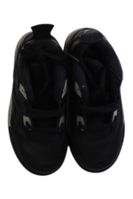 A Black Sneakers from Air Jordan in size 4T for boy. (Back View)