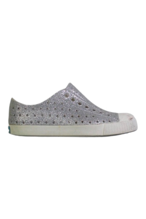 A Silver Slip Ons from Native Shoes in size 4T for girl. (Front View)