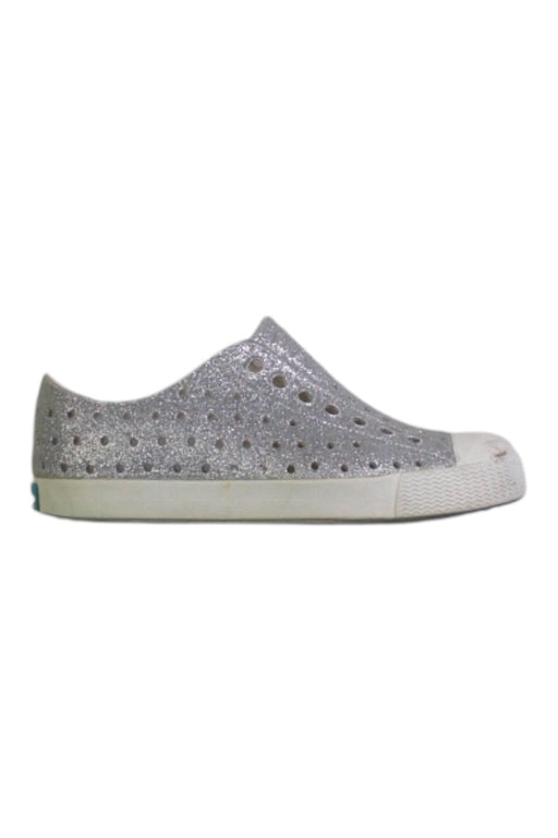 A Silver Slip Ons from Native Shoes in size 4T for girl. (Front View)