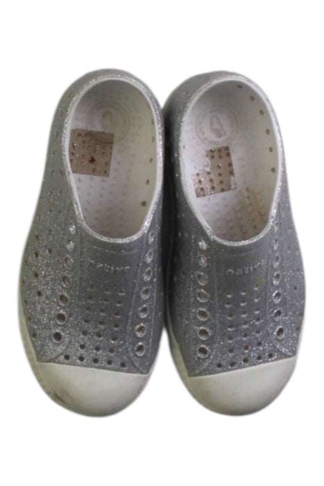 A Silver Slip Ons from Native Shoes in size 4T for girl. (Back View)