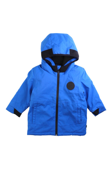 A Blue Rain Jackets from Boss in size 12-18M for boy. (Front View)