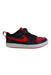 A Red Sneakers from Nike in size 10Y for boy. (Front View)