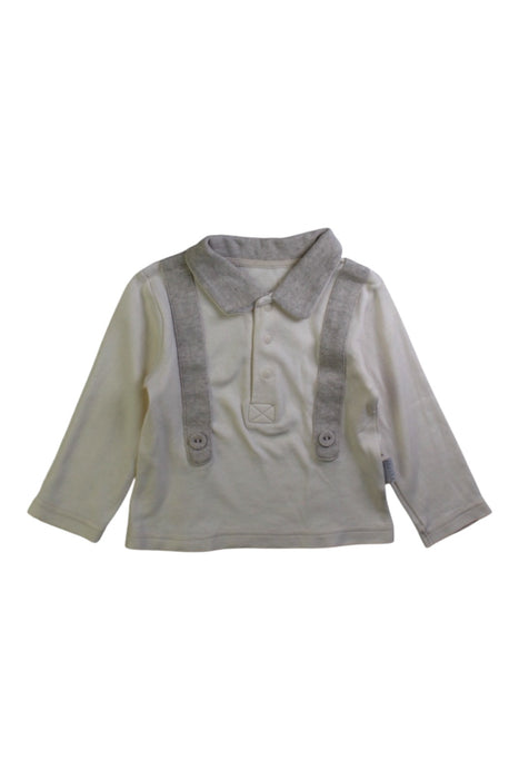 A White Long Sleeve Polos from Natures Purest in size 6-12M for boy. (Front View)