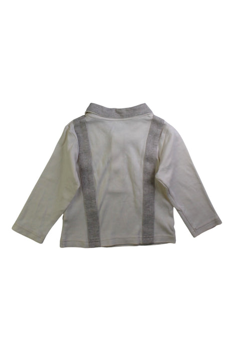 A White Long Sleeve Polos from Natures Purest in size 6-12M for boy. (Back View)