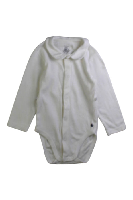A White Long Sleeve Bodysuits from Petit Bateau in size 6-12M for neutral. (Front View)