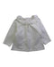 A White Long Sleeve Tops from Natalys in size 0-3M for girl. (Front View)