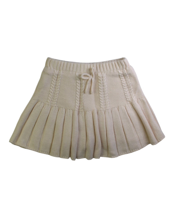 A Ivory Short Skirts from Petit Main in size 5T for girl. (Front View)
