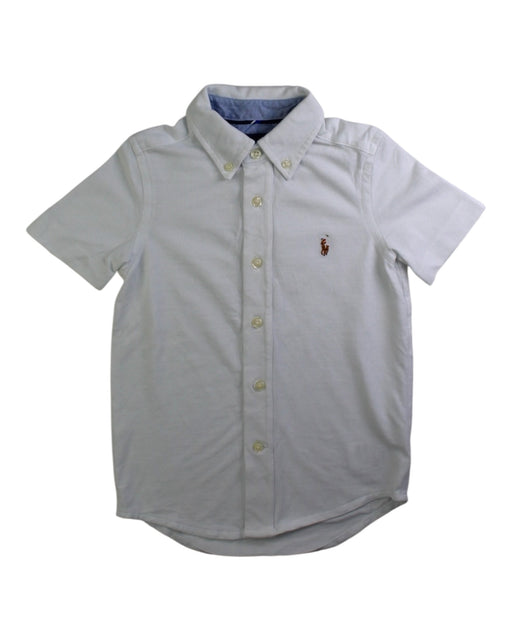 A White Short Sleeve Shirts from Polo Ralph Lauren in size 4T for boy. (Front View)