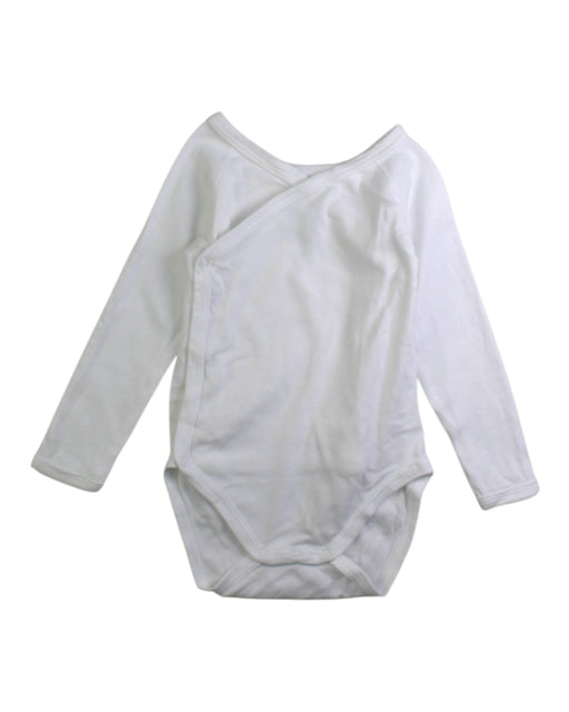 A White Long Sleeve Bodysuits from Petit Bateau in size 6-12M for neutral. (Front View)