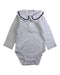A White Long Sleeve Bodysuits from Jacadi in size 3-6M for girl. (Front View)