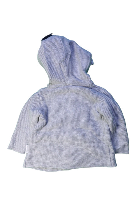 A Blue Coats from Korango in size Newborn for girl. (Back View)