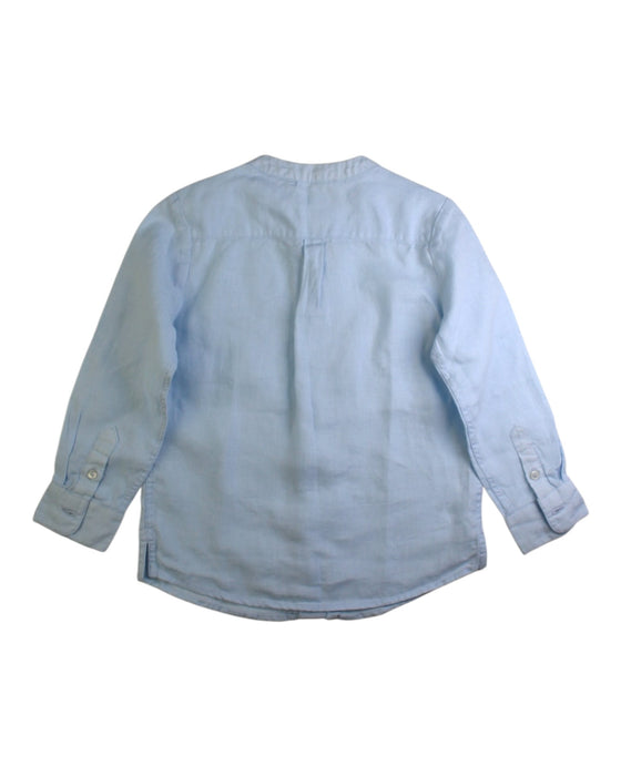 A Blue Long Sleeve Shirts from Jacadi in size 5T for boy. (Back View)
