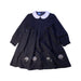 A Navy Long Sleeve Dresses from Familiar in size 4T for girl. (Front View)