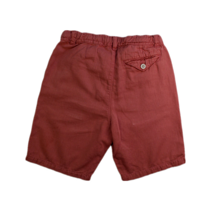 A Red Shorts from Mayoral in size 7Y for boy. (Back View)