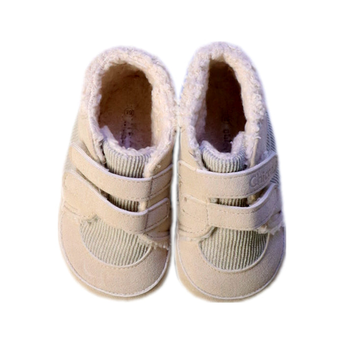 A White Booties from Chicco in size 12-18M for boy. (Back View)