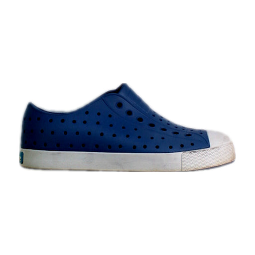 A Navy Slip Ons from Native Shoes in size 7Y for neutral. (Front View)