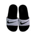 A Black Slippers from Nike in size 7Y for boy. (Back View)