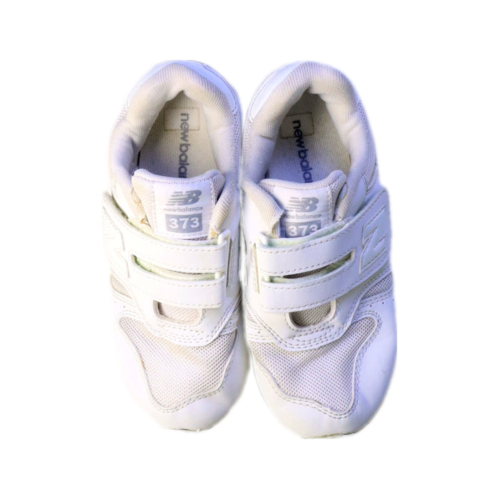 A White Sneakers from New Balance in size 6T for girl. (Back View)