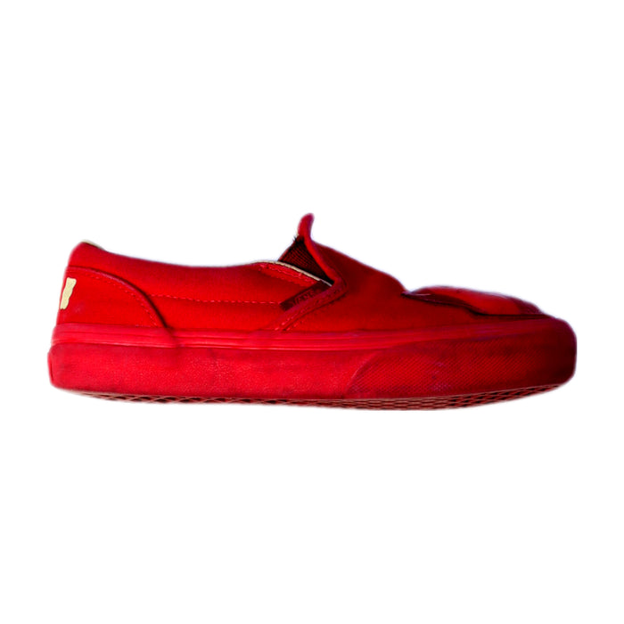 A Red Slip Ons from Vans in size 7Y for neutral. (Front View)