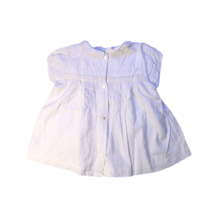A White Short Sleeve Dresses from Little Cotton Clothes in size 5T for girl. (Back View)