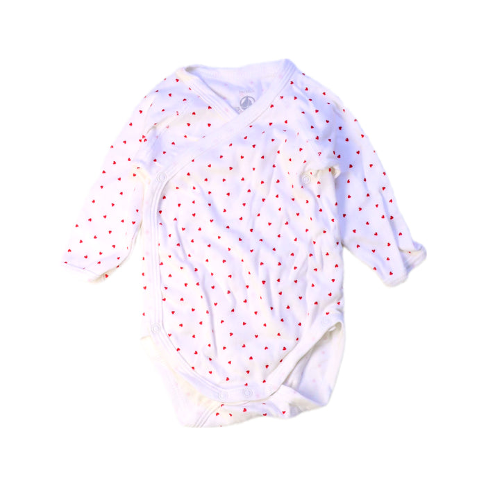 A White Long Sleeve Bodysuits from Petit Bateau in size 0-3M for girl. (Front View)
