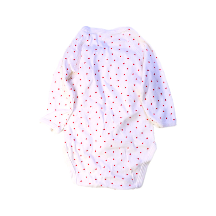 A White Long Sleeve Bodysuits from Petit Bateau in size 0-3M for girl. (Back View)
