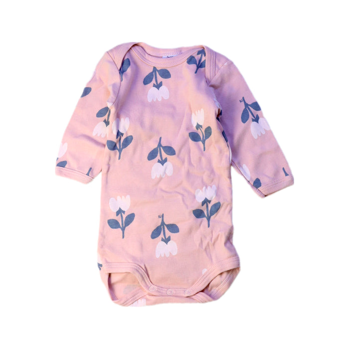 A Pink Long Sleeve Bodysuits from Petit Bateau in size 0-3M for girl. (Front View)