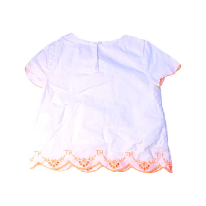 A White Short Sleeve Tops from Tommy Hilfiger in size 4T for girl. (Back View)