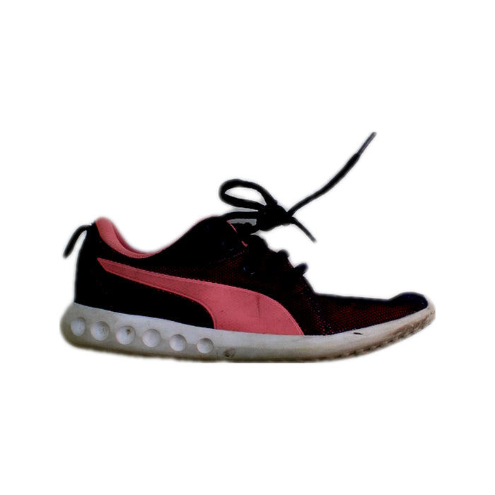 A Black Sneakers from Puma in size 12Y for girl. (Front View)