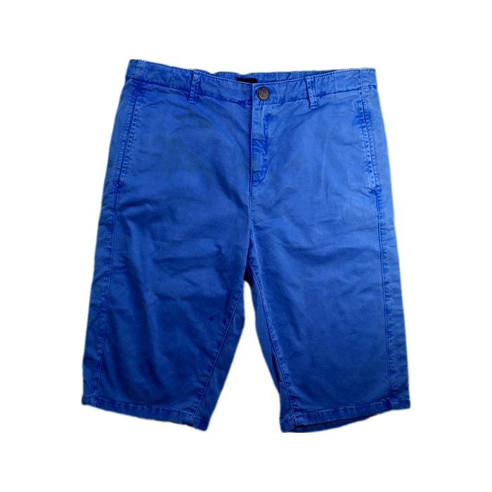A Blue Shorts from IKKS in size 14Y for boy. (Front View)