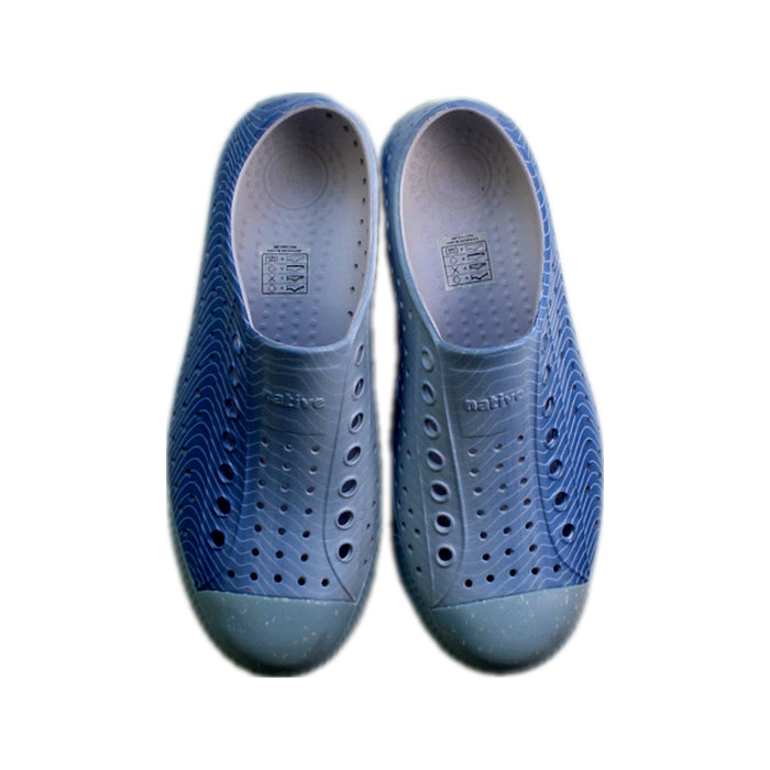 A Blue Slip Ons from Native Shoes in size 12Y for neutral. (Back View)