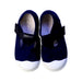 A Navy Flats from Jacadi in size 18-24M for girl. (Back View)