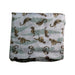 A White Swaddles from Nest Designs in size Newborn for boy. (Back View)