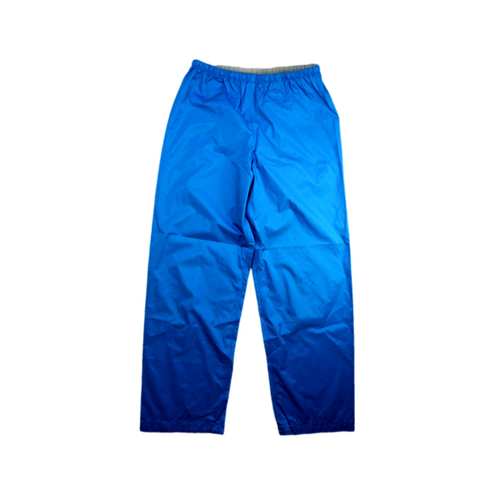 A Blue Casual Pants from Mont-bell in size 11Y for boy. (Front View)