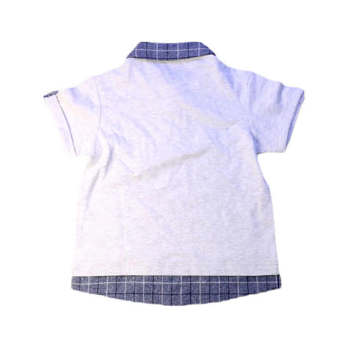 A White Short Sleeve Polos from Chickeeduck in size 4T for boy. (Back View)