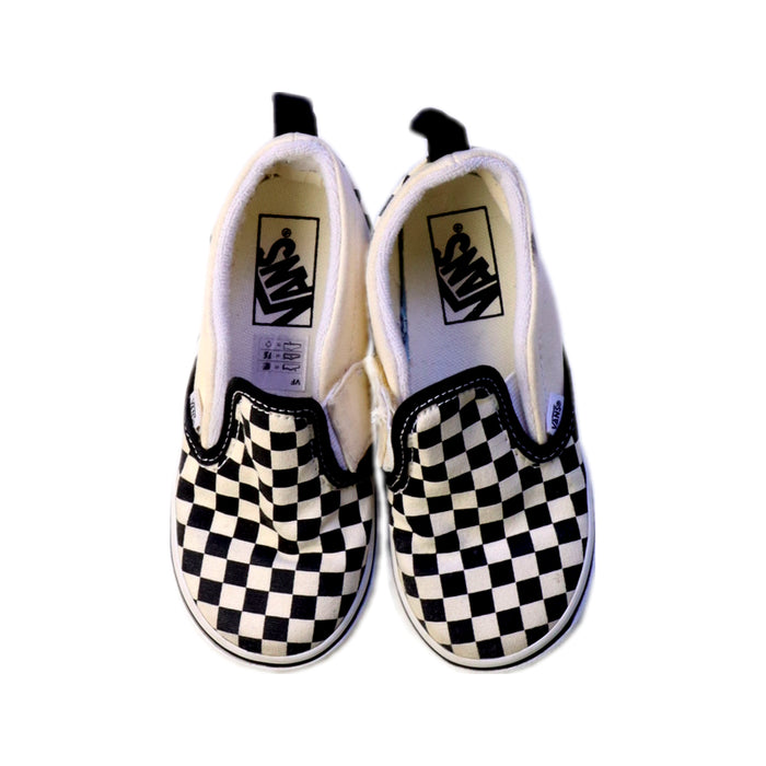 A Black Slip Ons from Vans in size 3T for girl. (Back View)