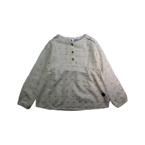 A Beige Long Sleeve Tops from La Compagnie des Petits in size 5T for girl. (Front View)